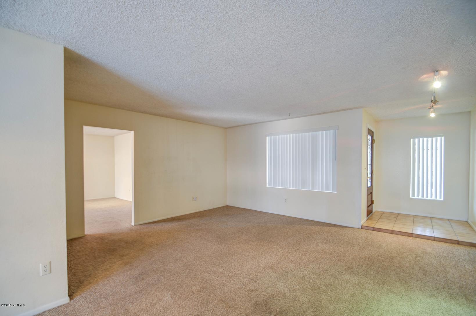 4233 West Ruth Avenue Phoenix, AZ 85051 - Photo 7 of 39 living room-2