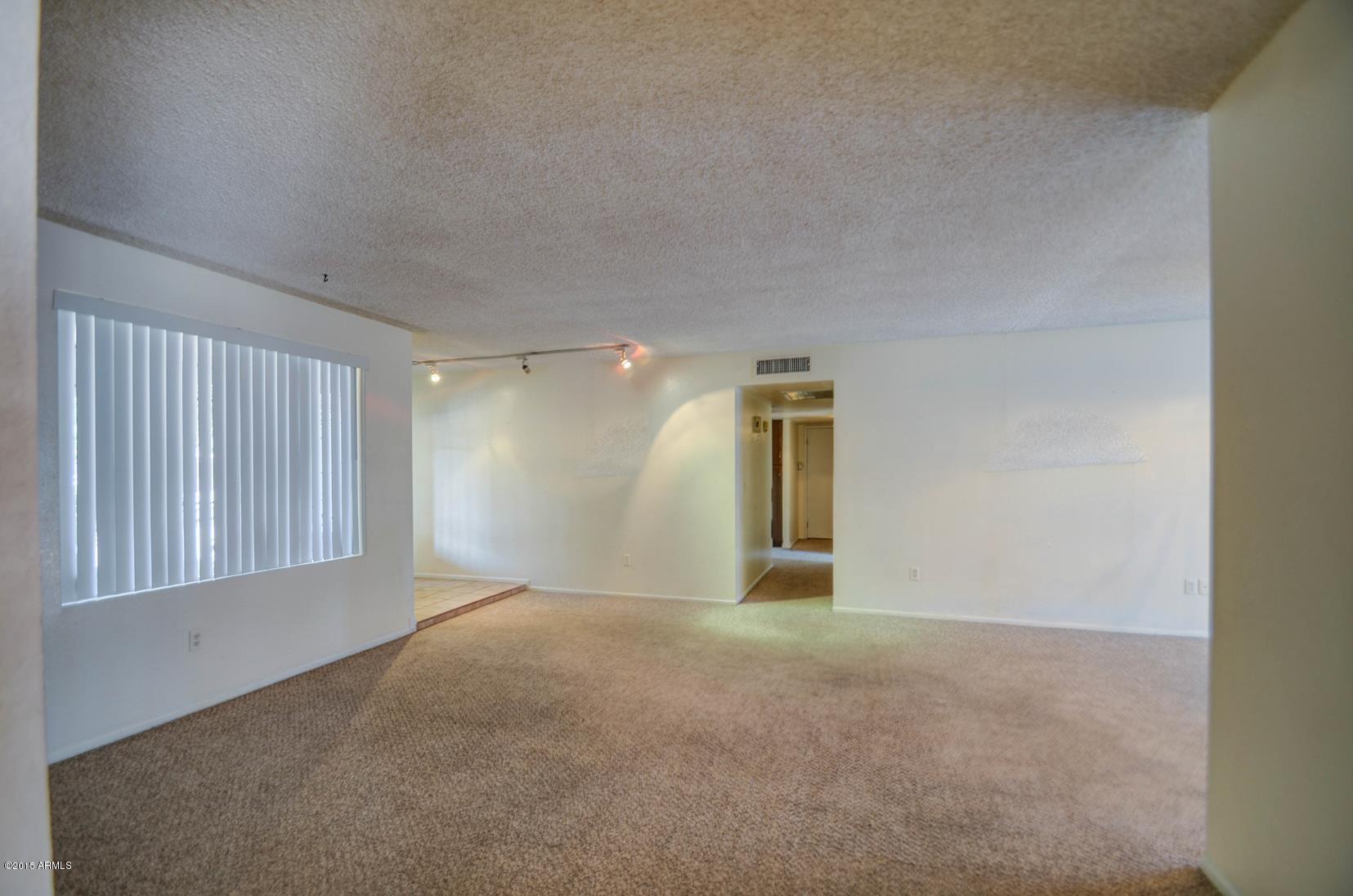 4233 West Ruth Avenue Phoenix, AZ 85051 - Photo 8 of 39 living room-3