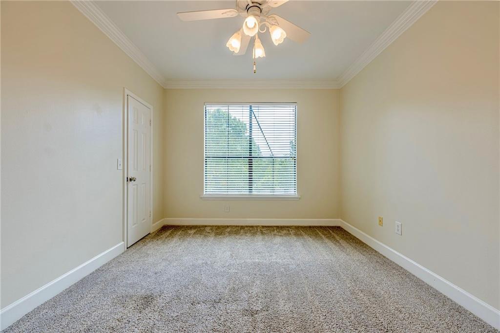 3777 Peachtree Road Northeast, Unit 1632 Brookhaven, GA 30319 - Photo 21 of 43 an empty room with a window