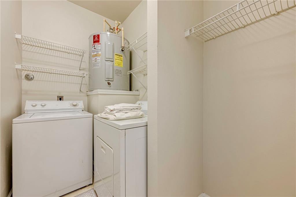 3777 Peachtree Road Northeast, Unit 1632 Brookhaven, GA 30319 - Photo 24 of 43 a utility room with dryer and washer