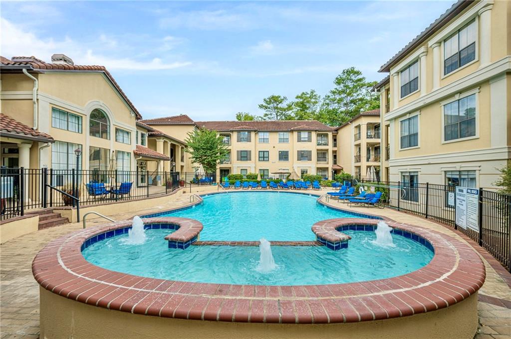 3777 Peachtree Road Northeast, Unit 1632 Brookhaven, GA 30319 - Photo 29 of 43 a view of outdoor space yard and swimming pool