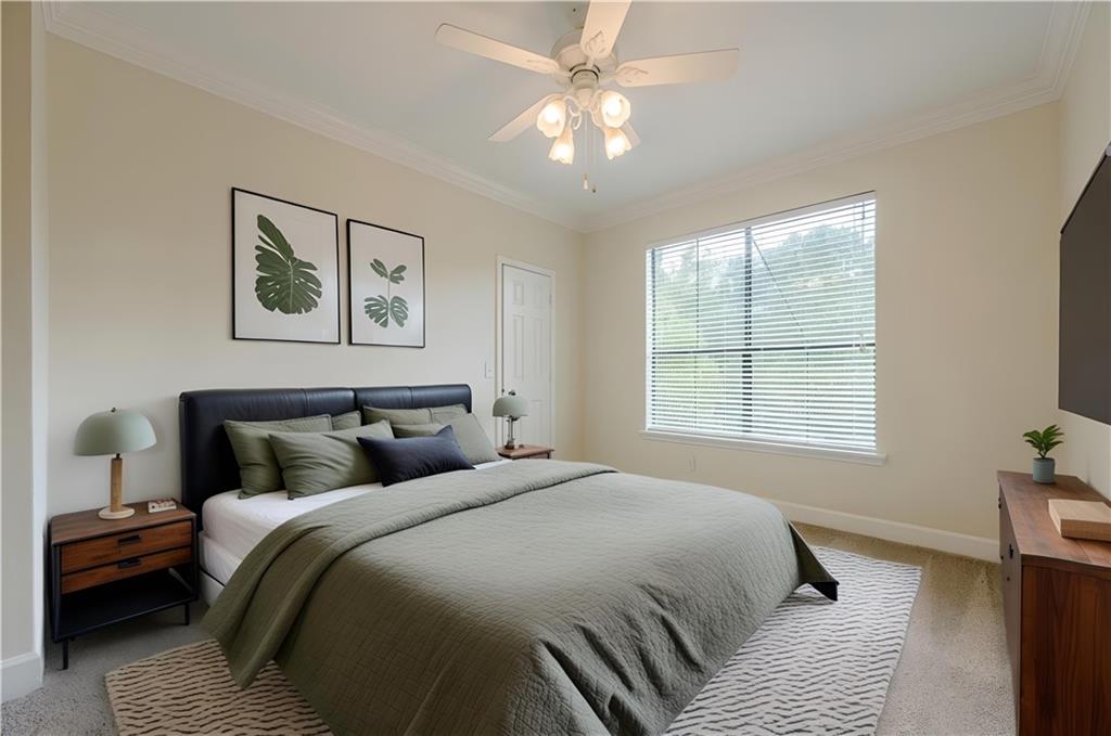 3777 Peachtree Road Northeast, Unit 1632 Brookhaven, GA 30319 - Photo 4 of 43 a bedroom with bed and a window