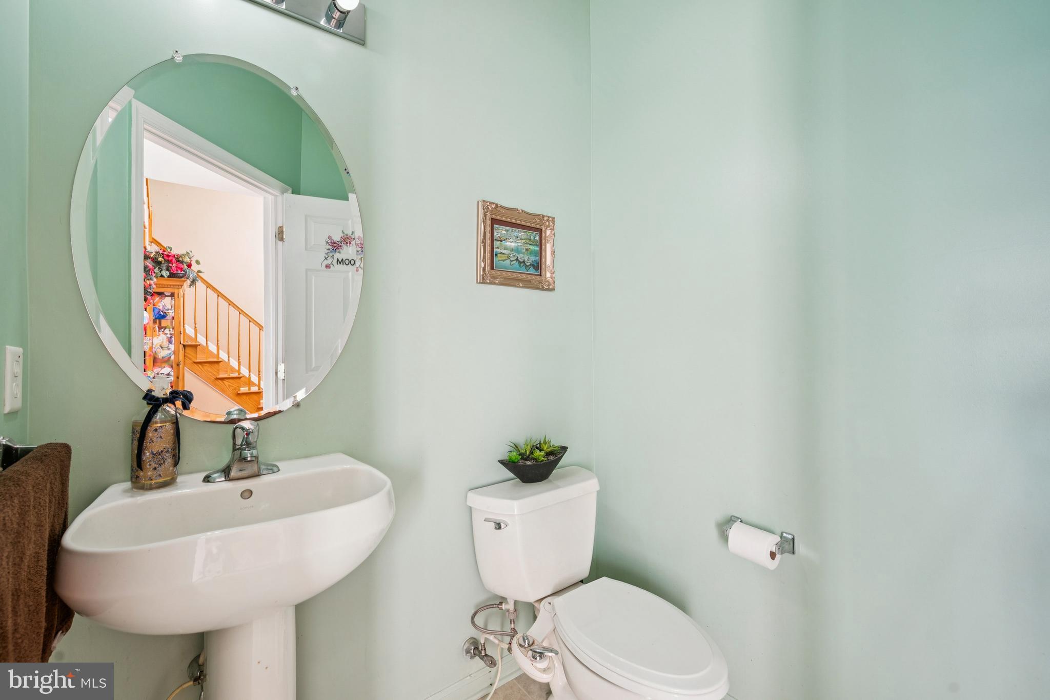 17 Jasmine Way Sewell, NJ 08080 - Photo 14 of 30 a bathroom with a toilet sink and mirror