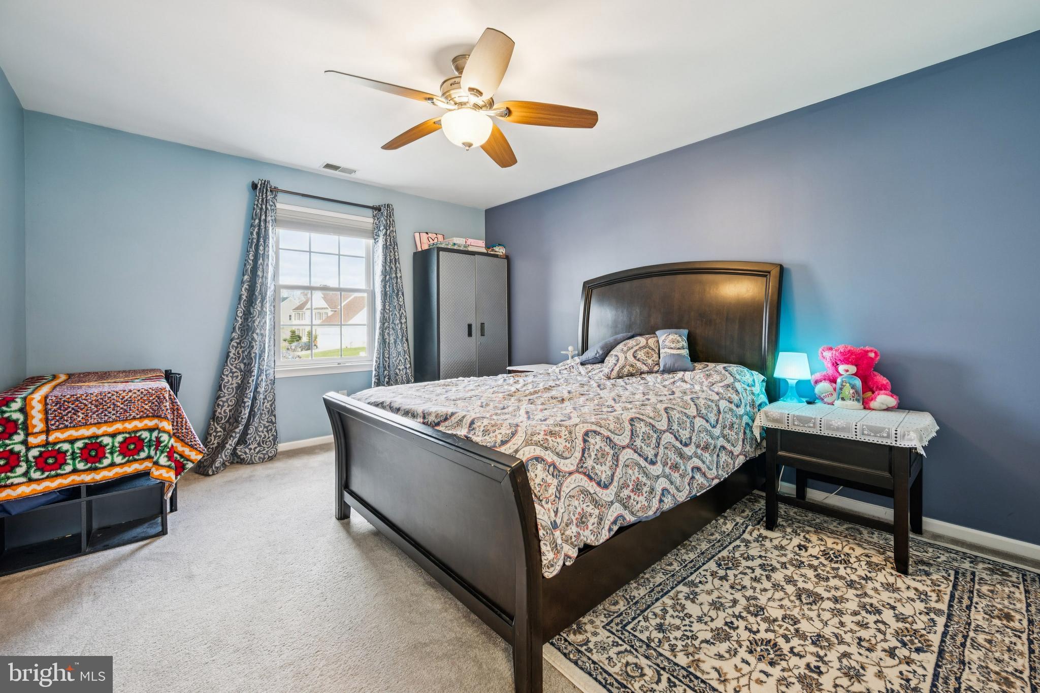 17 Jasmine Way Sewell, NJ 08080 - Photo 19 of 30 a bedroom with a bed and a chandelier