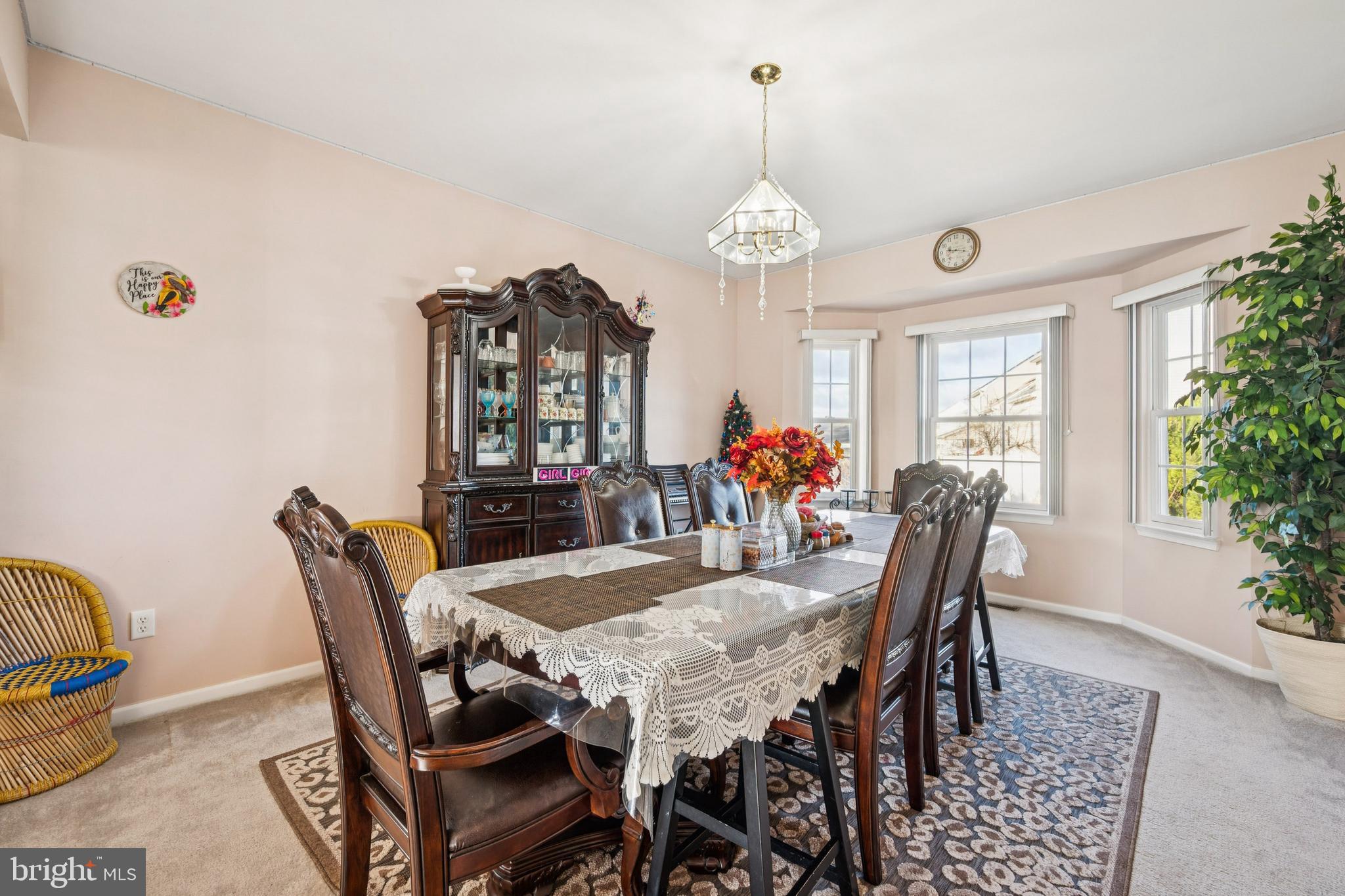 17 Jasmine Way Sewell, NJ 08080 - Photo 8 of 30 a view of a dining room with furniture a chandelier and wooden floor
