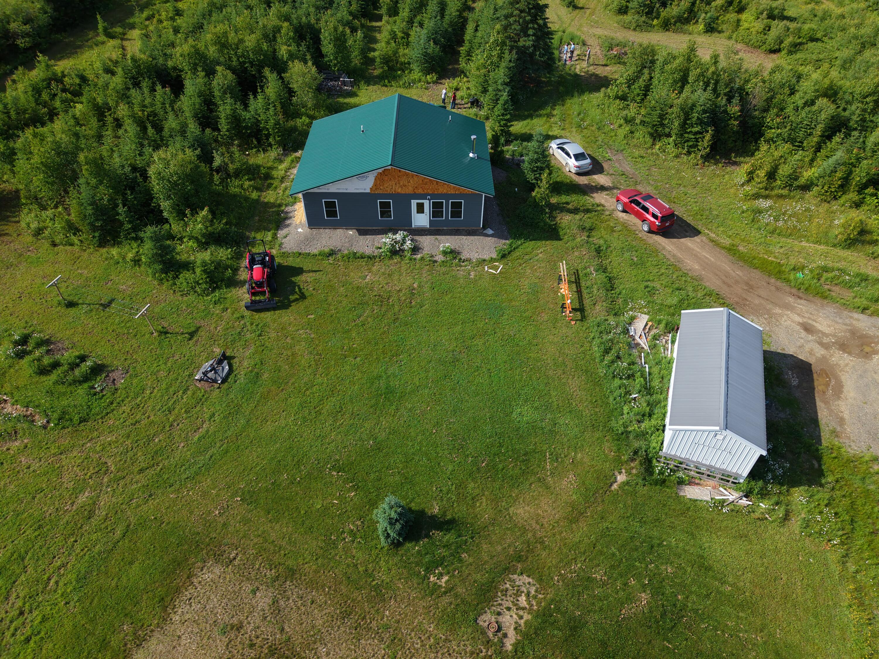 180 Moose Brook Road Ludlow, ME 04730 - Photo 1 of 14 DJI_20260625164341_0053_D