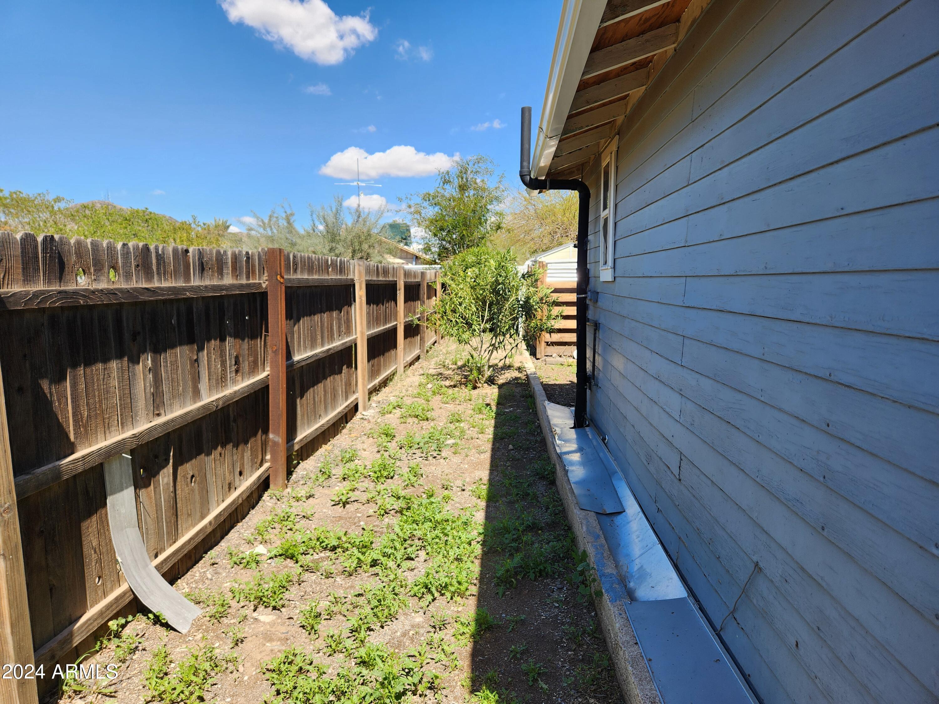 9028 North 11th Street, Unit 3 Phoenix, AZ 85020 - Photo 7 of 7 a view of balcony with wooden floor and city view