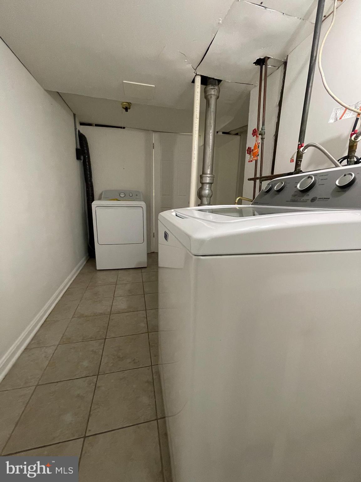 12306 Veirs Mill Road Silver Spring, MD 20906 - Photo 19 of 45 a bathroom with a sink and a mirror