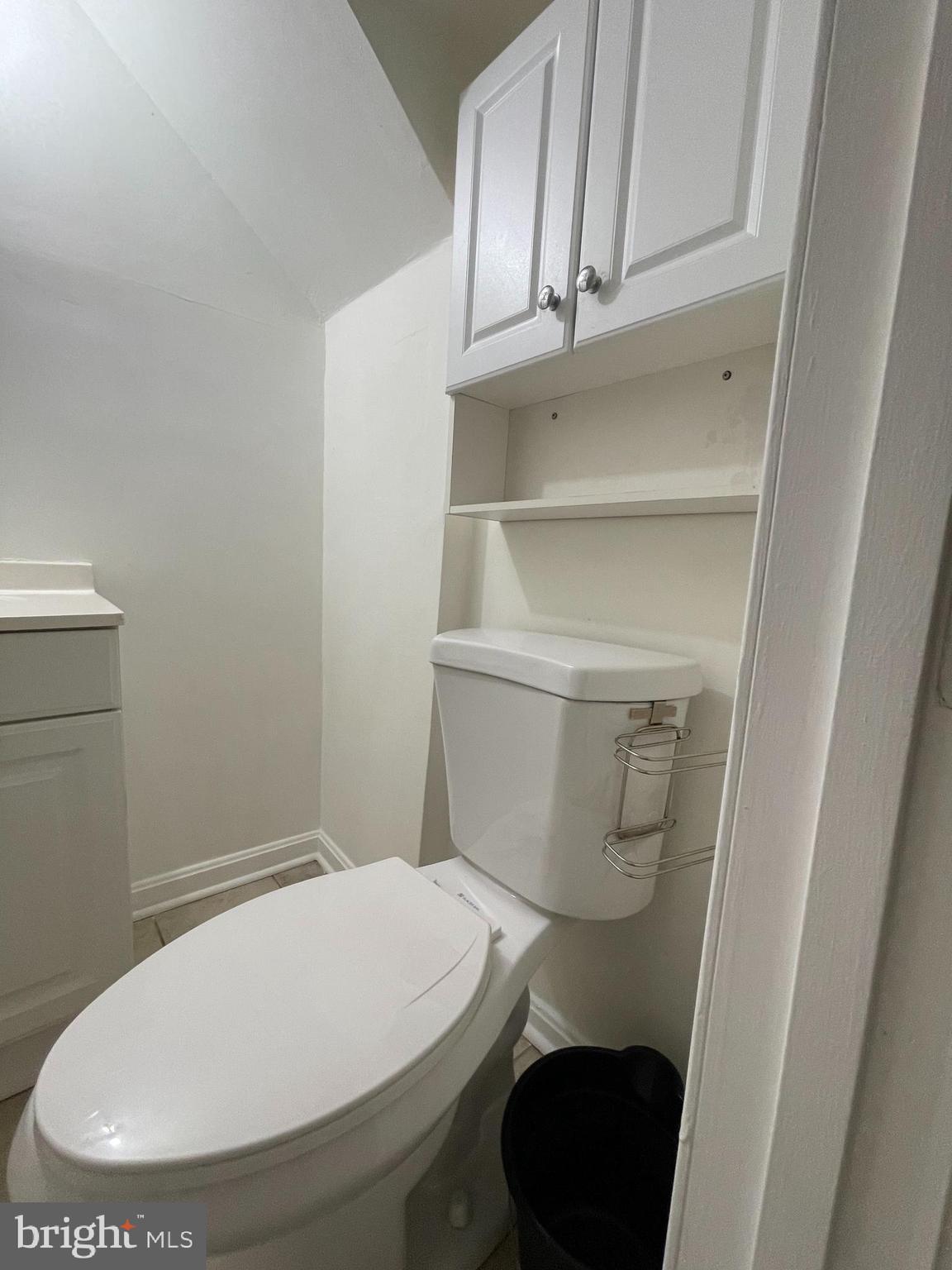 12306 Veirs Mill Road Silver Spring, MD 20906 - Photo 21 of 45 a bathroom with a toilet and a sink