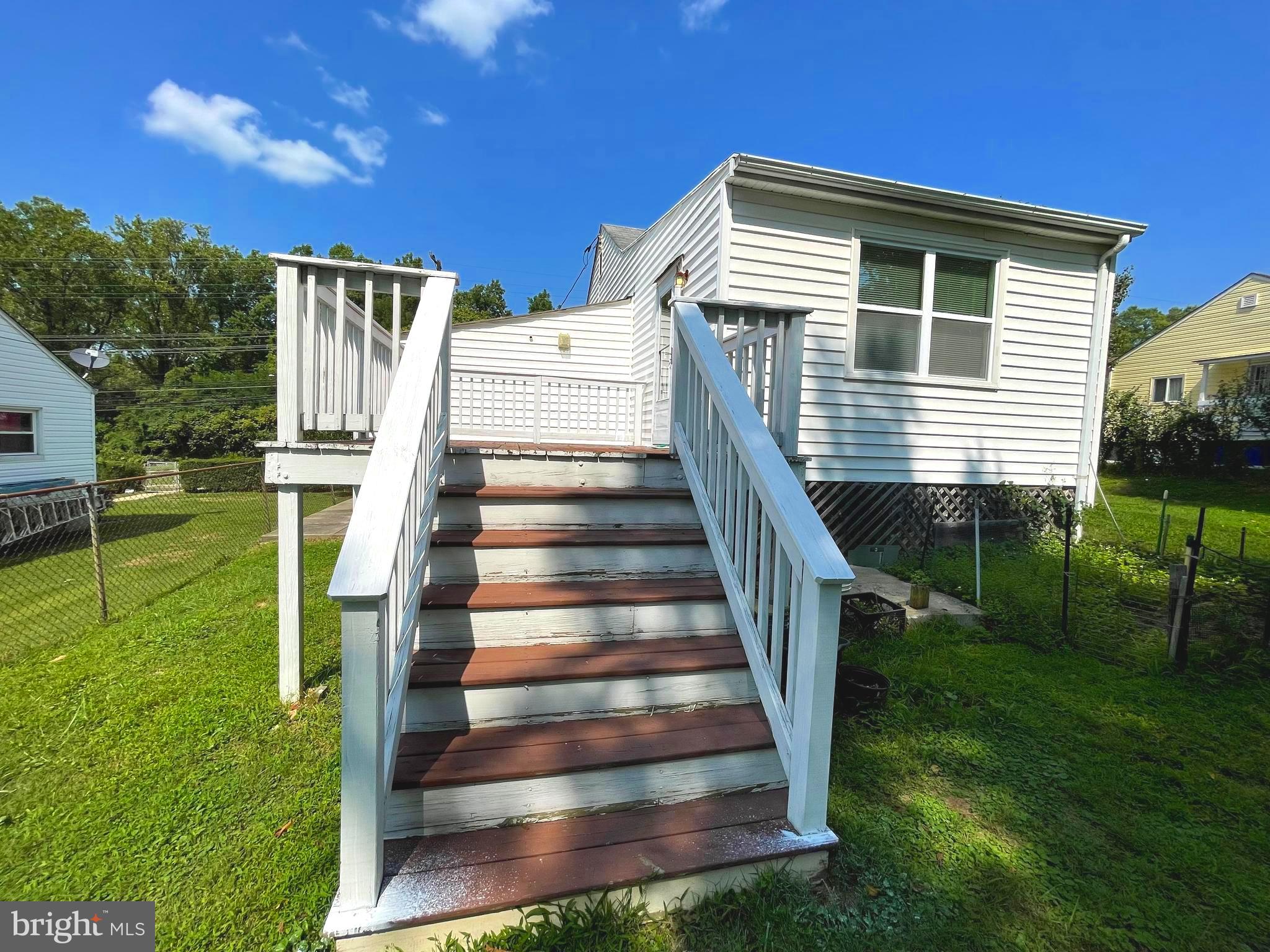 12306 Veirs Mill Road Silver Spring, MD 20906 - Photo 6 of 45 a front view of house with yard and green space