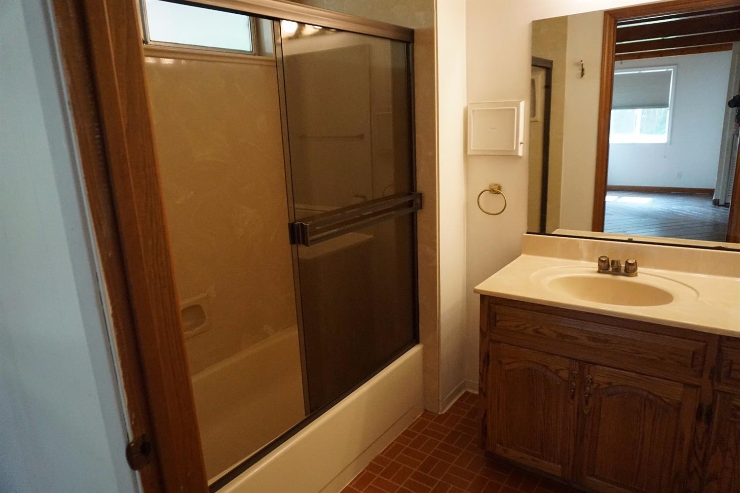 1312 Talent Avenue Talent, OR 97540 - Photo 9 of 21 a bathroom with a sink and a mirror