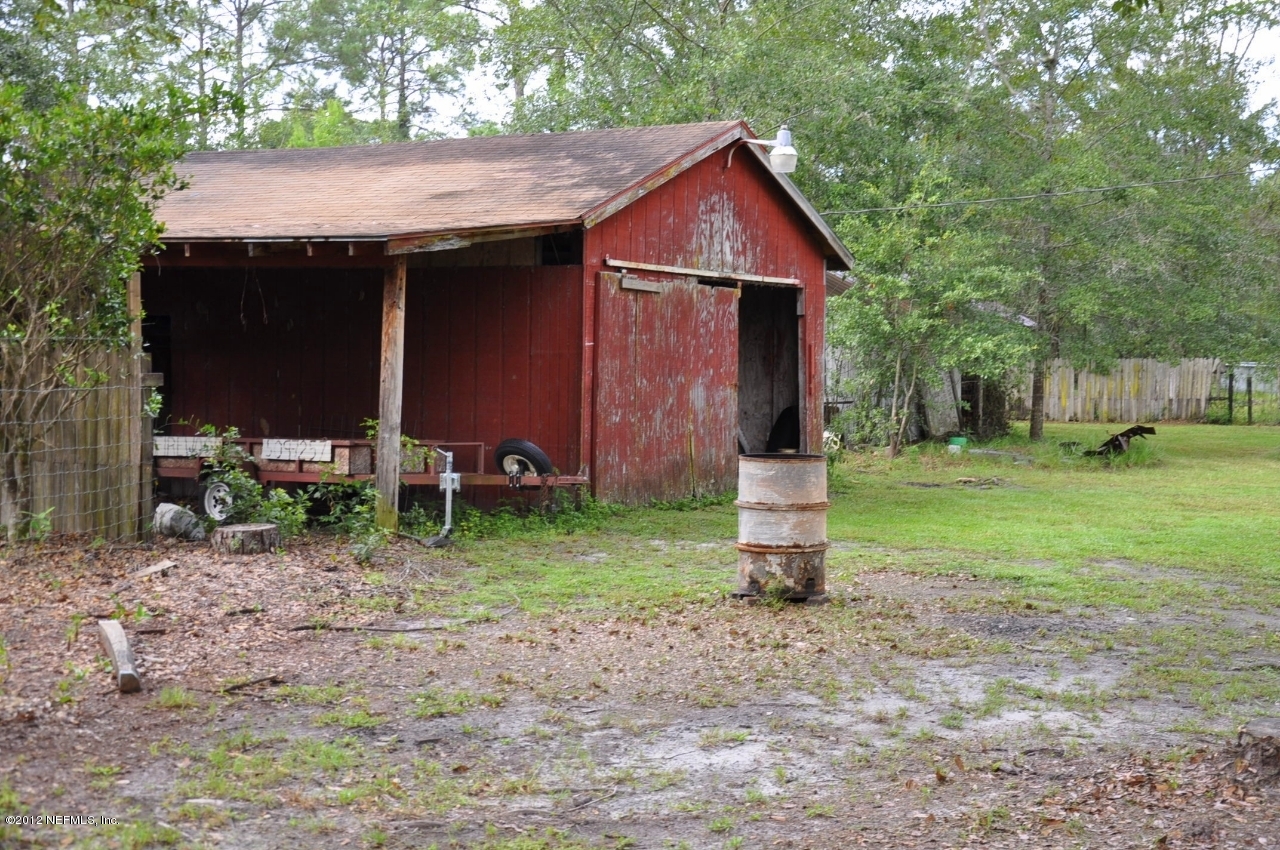 4147 Pinto Road Middleburg, FL 32068 - Photo 3 of 31 a front view of house with a garden