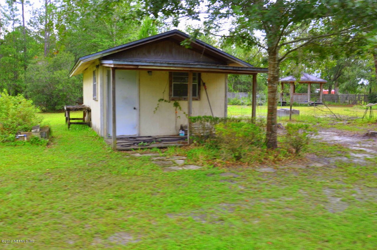 4147 Pinto Road Middleburg, FL 32068 - Photo 7 of 31 a front view of house with yard and green space