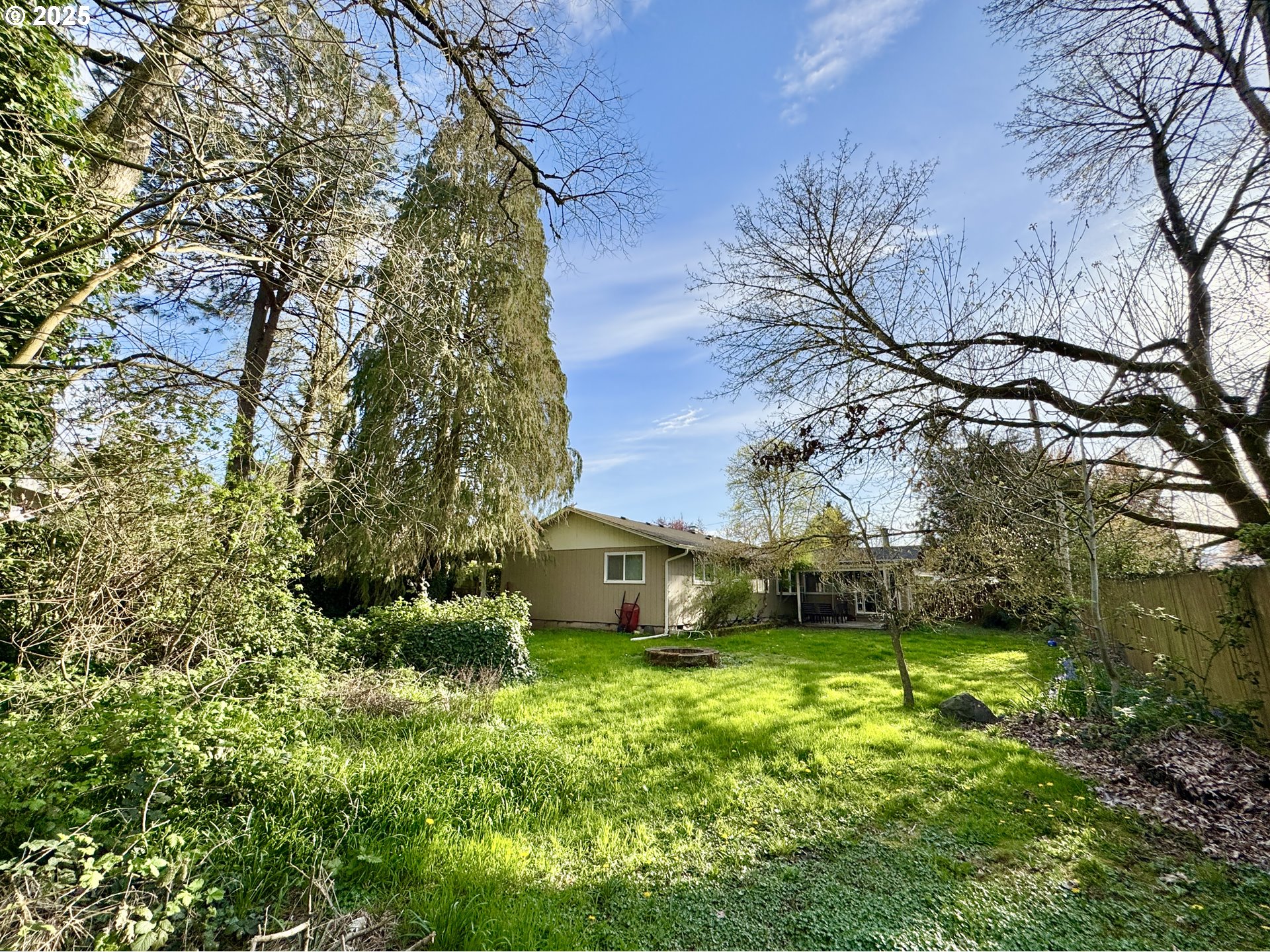 397 River Loop 2 Eugene, OR 97404 - Photo 31 of 42 a view of a house with a yard