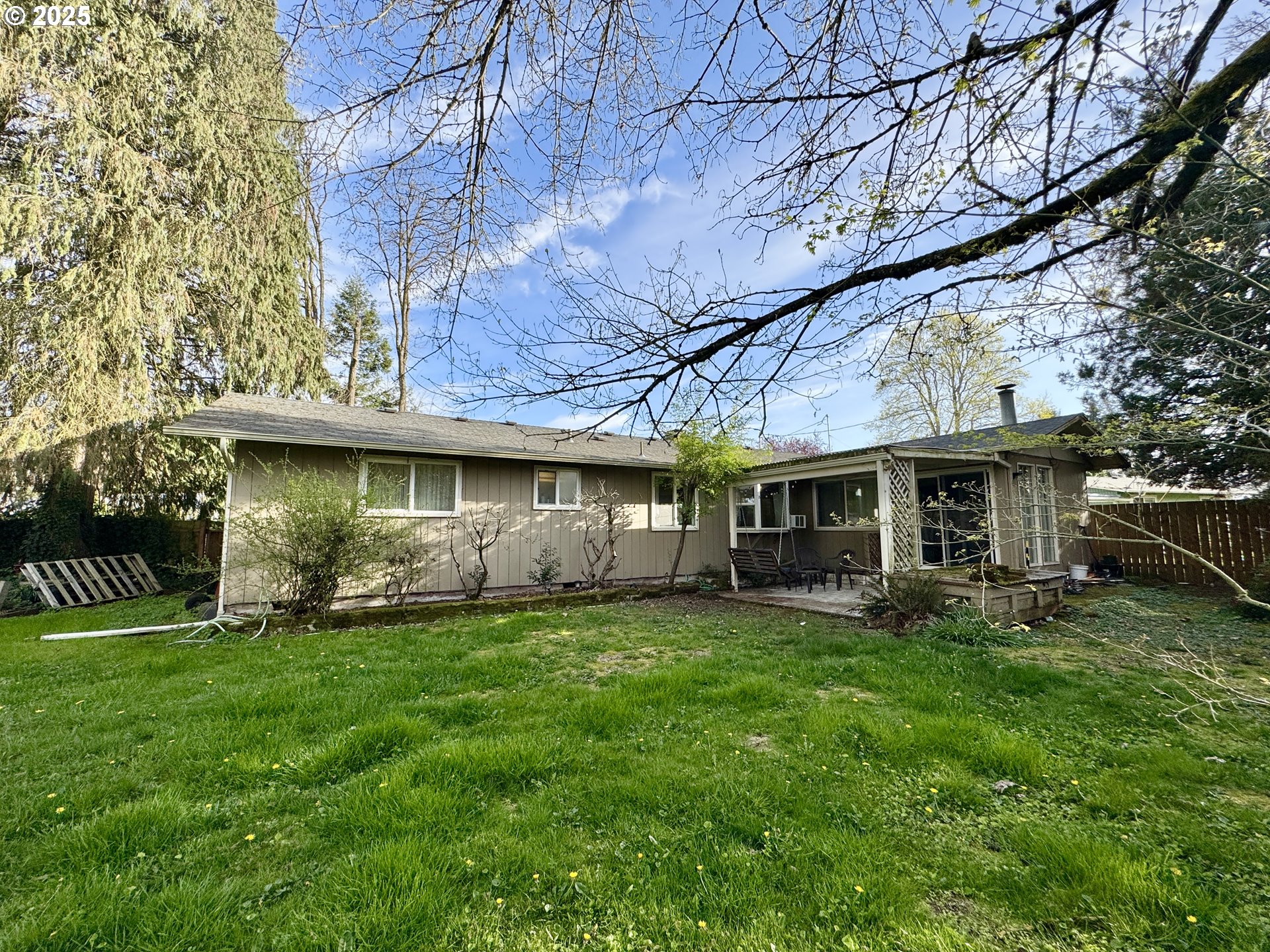 397 River Loop 2 Eugene, OR 97404 - Photo 34 of 42 a view of a yard with a large tree