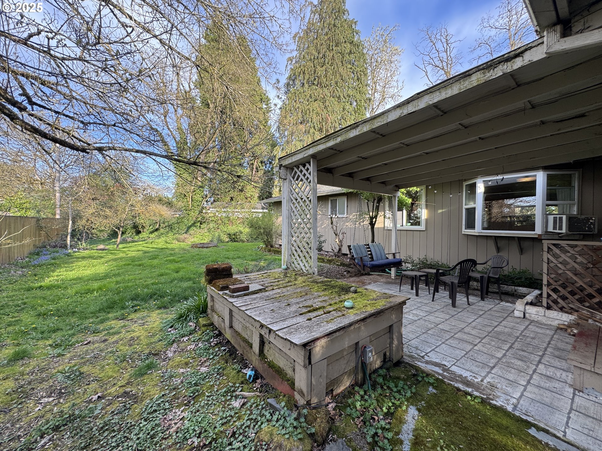397 River Loop 2 Eugene, OR 97404 - Photo 35 of 42 a view of a house with backyard and sitting area