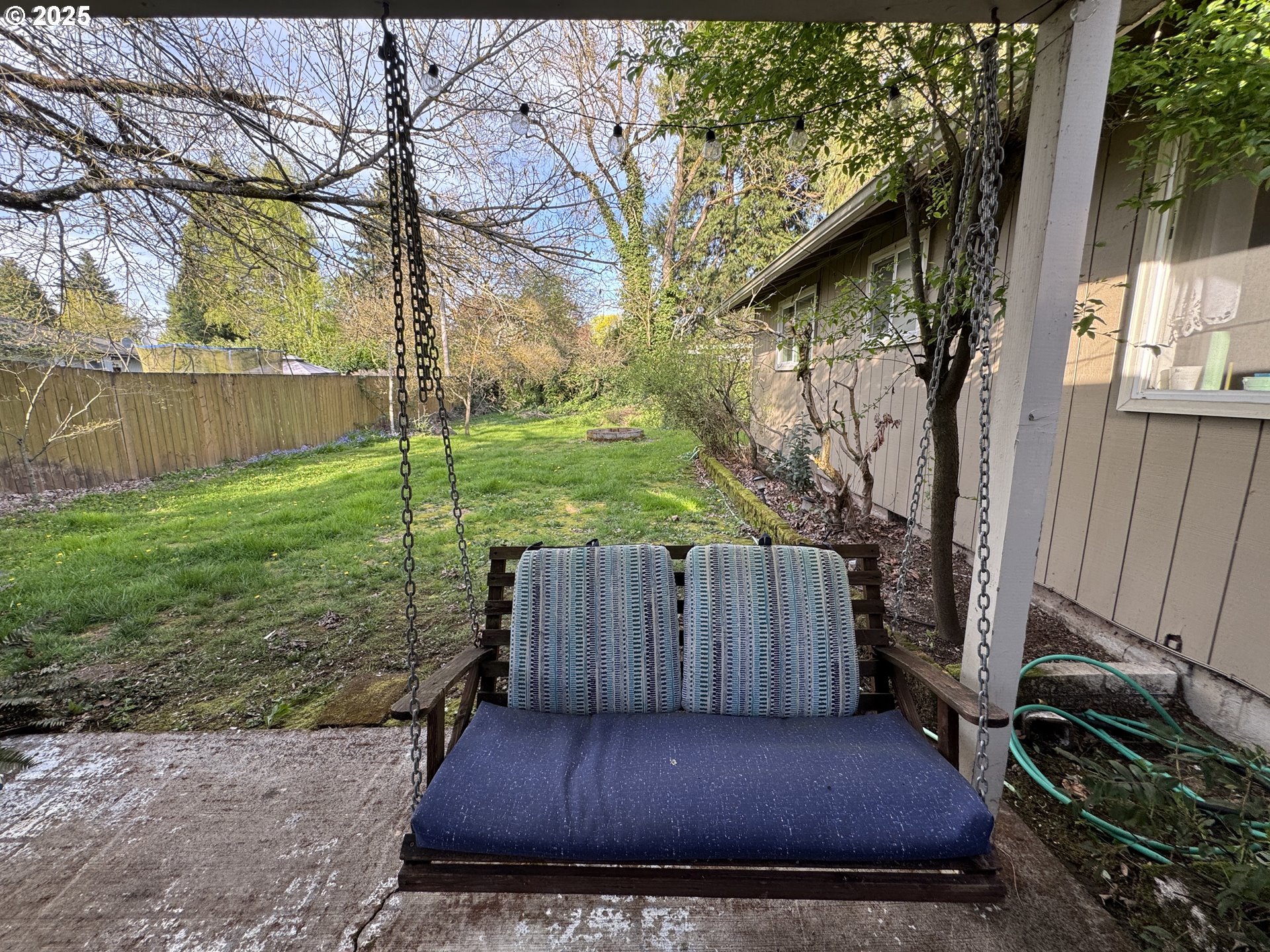 397 River Loop 2 Eugene, OR 97404 - Photo 39 of 42 a view of a backyard with wooden fence