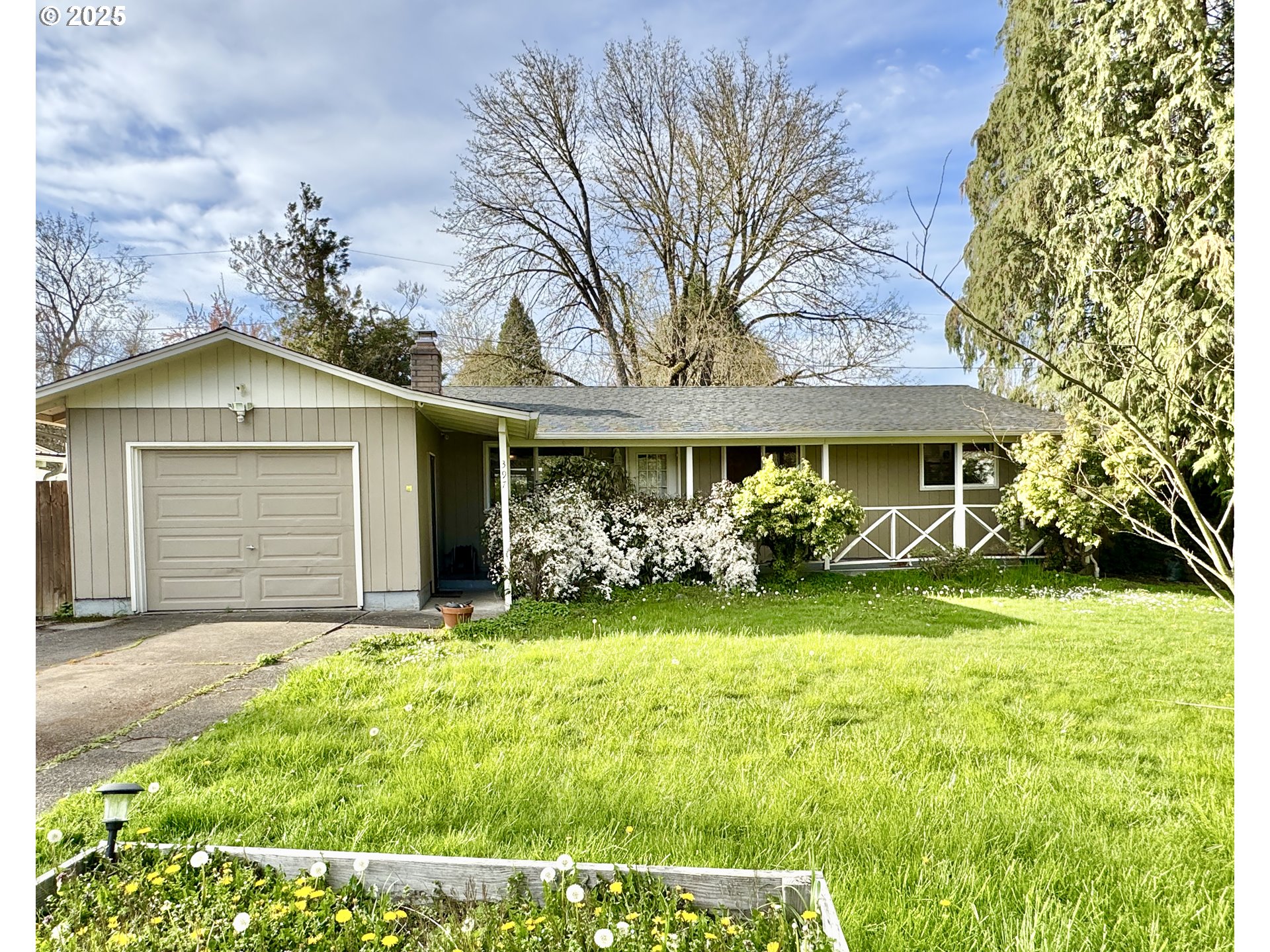 397 River Loop 2 Eugene, OR 97404 - Photo 41 of 42 a view of a house with garden and yard