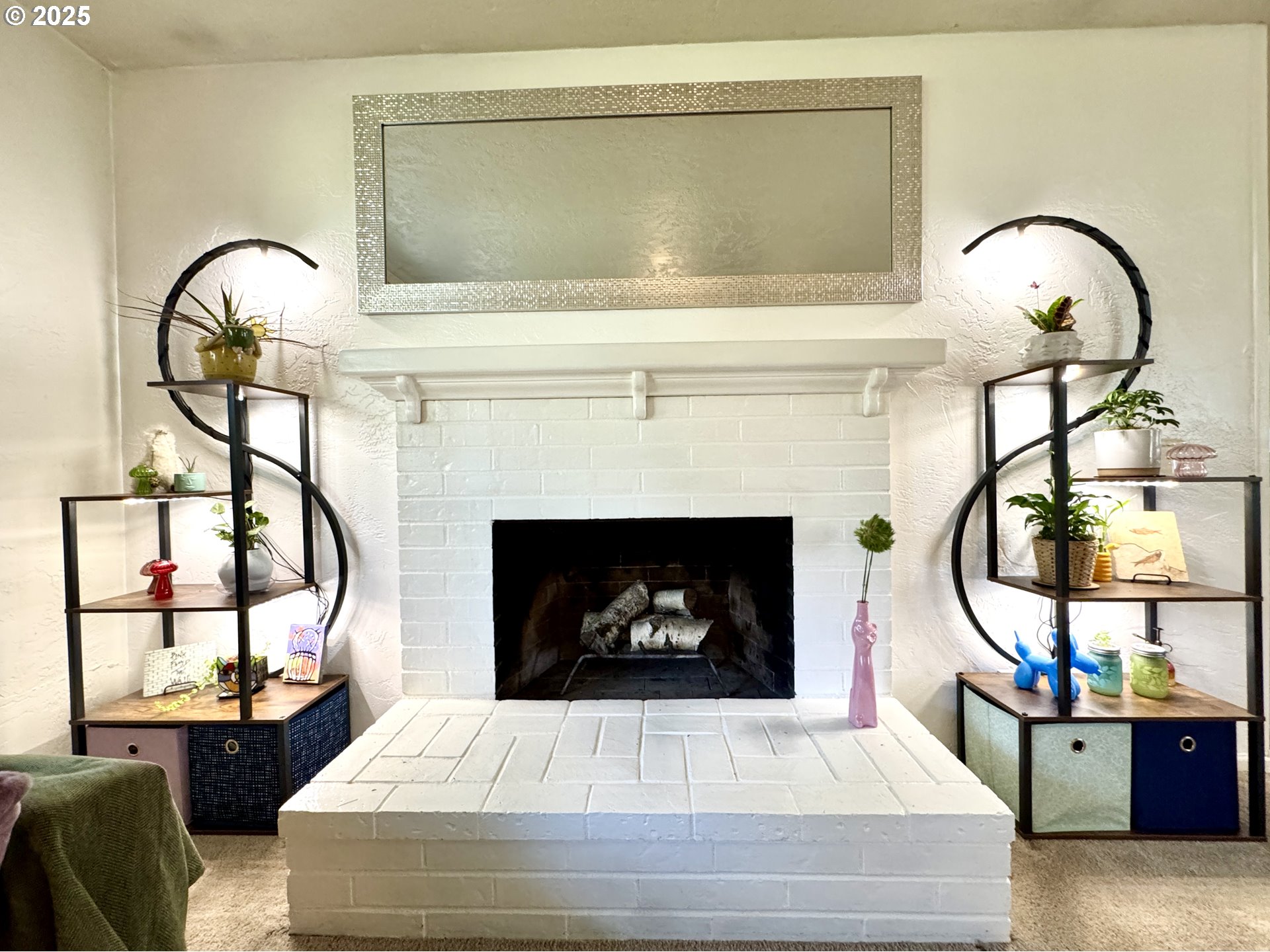 397 River Loop 2 Eugene, OR 97404 - Photo 7 of 42 a living room with furniture a fireplace and a floor to ceiling window
