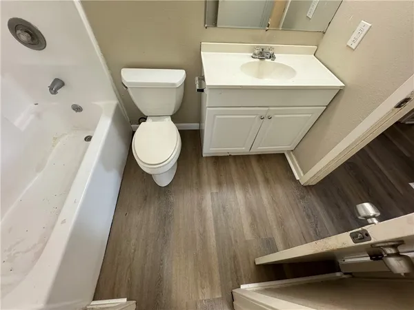 a bathroom with a sink and a toilet