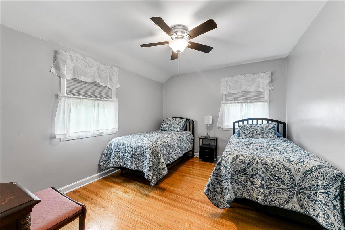 345 Holt Lane Springfield, PA 19064 - Photo 19 of 38 Second bedroom with wood floors and ceiling fan