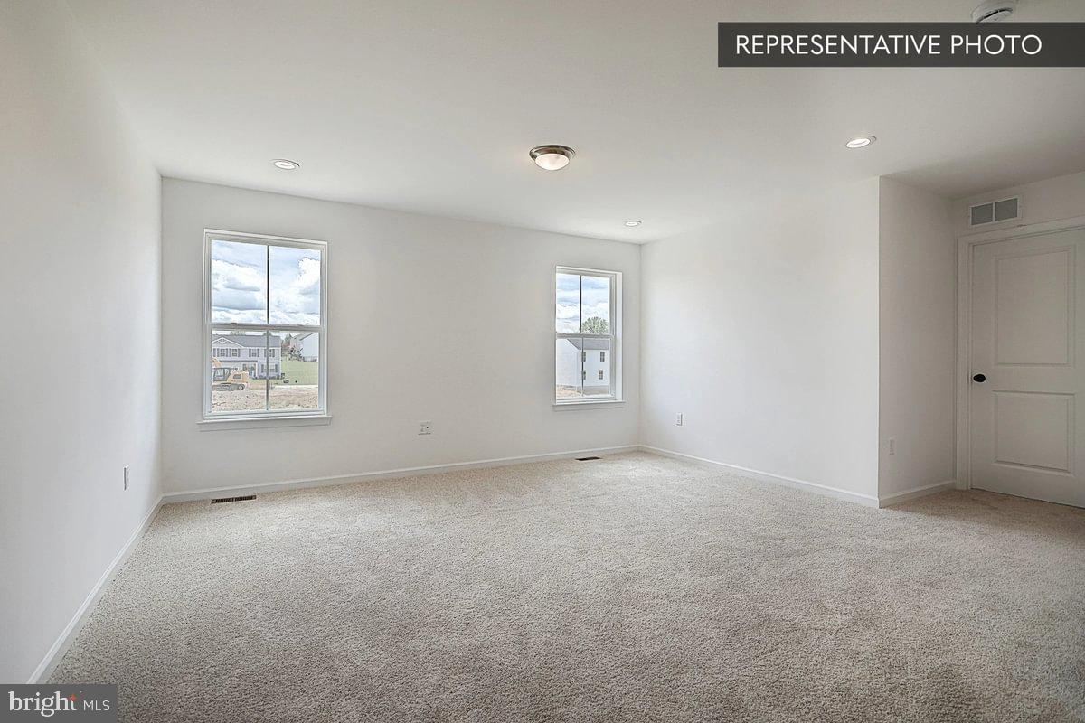6318 Liam Dr Spring Grove Spring Grove, PA 17362 - Photo 13 of 18 an empty room with windows