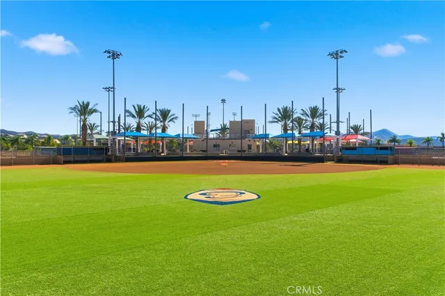 a view of a table and chairs in the garden