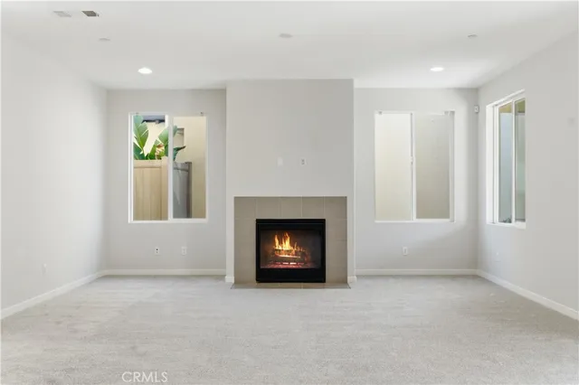 a living room with a fireplace