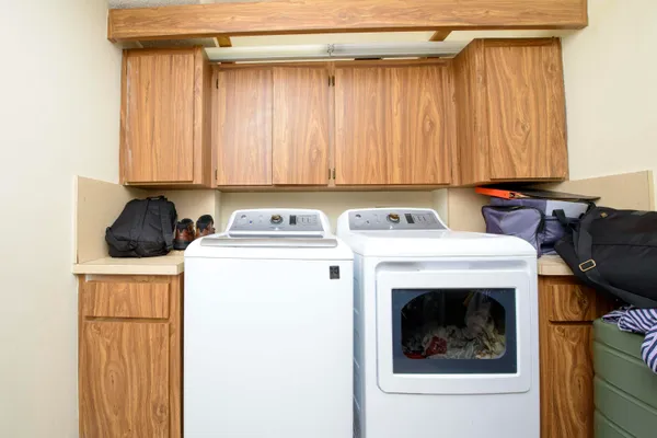 a utility room with dryer and washer