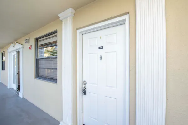 a view of a bathroom from a hallway