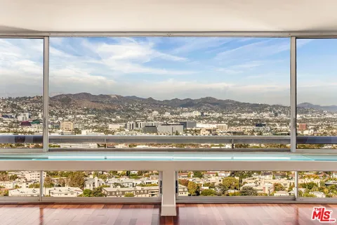 a view of a large buildings and a ocean view