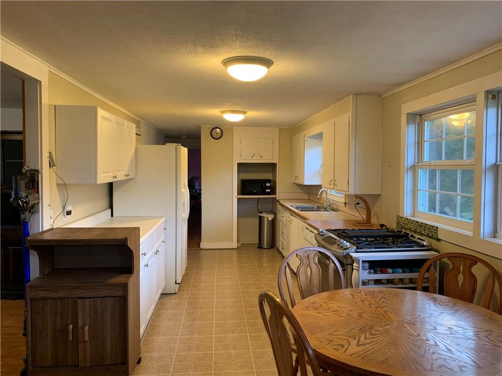 203 Swan Road Hermon, ME 04401 - Photo 6 of 27 Dining Area and Kitchen
