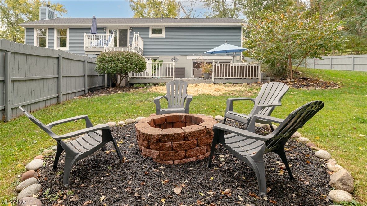 301 Perry Drive Northwest Canton, OH 44708 - Photo 10 of 34 View of deck and patio from outdoor fire pit