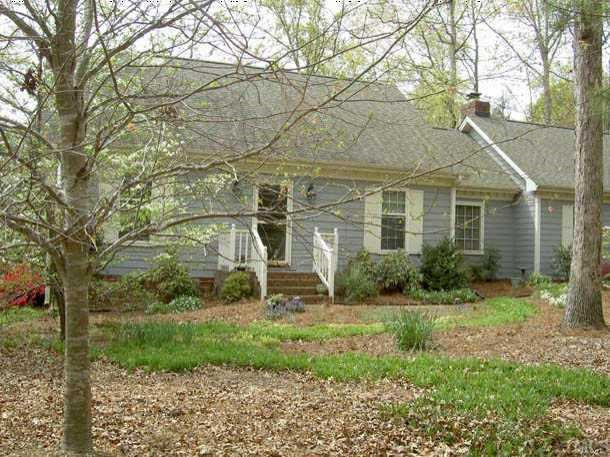 228 Carriage Trail Raleigh, NC 27614 - Photo 1 of 1 Front view of home filled with hardwoods, azaleas etc. Exterior Front