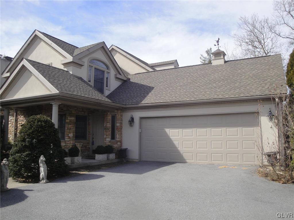1039 Stone Stack Drive Bethlehem, PA 18015 - Photo 1 of 35 a front view of a house with garage