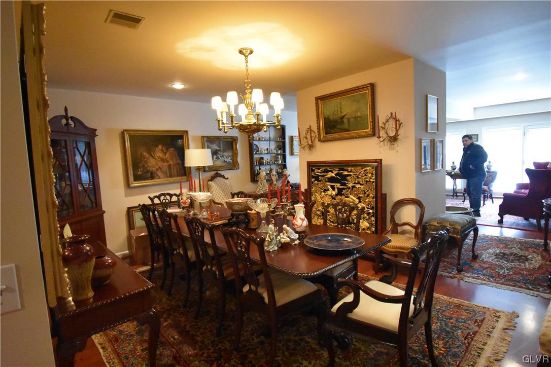 1039 Stone Stack Drive Bethlehem, PA 18015 - Photo 17 of 35 a view of a dining room with furniture and chandelier