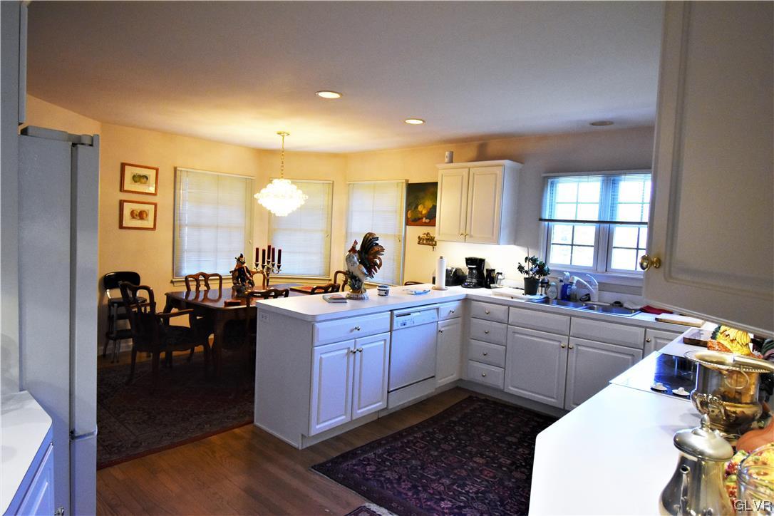 1039 Stone Stack Drive Bethlehem, PA 18015 - Photo 19 of 35 a kitchen with lots of counter top space and dining table