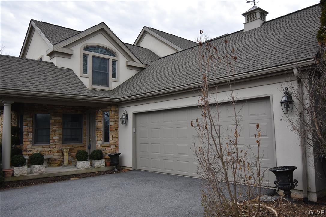 1039 Stone Stack Drive Bethlehem, PA 18015 - Photo 2 of 35 a front view of a house with garage