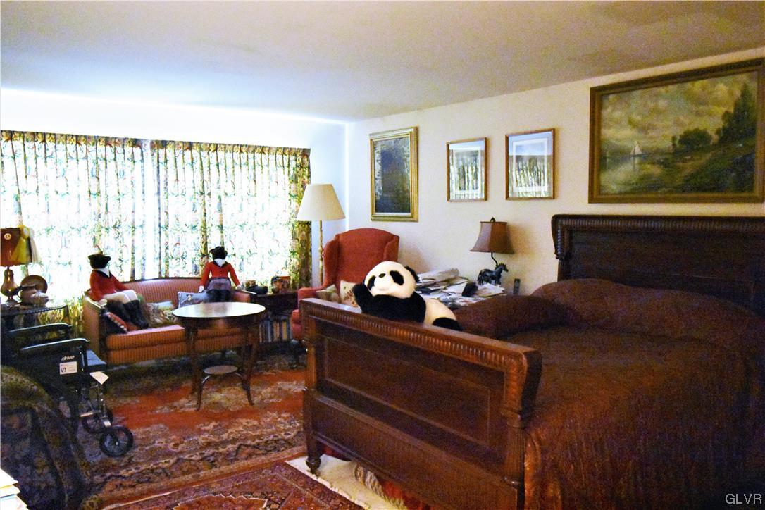 1039 Stone Stack Drive Bethlehem, PA 18015 - Photo 22 of 35 a living room with furniture and a large window