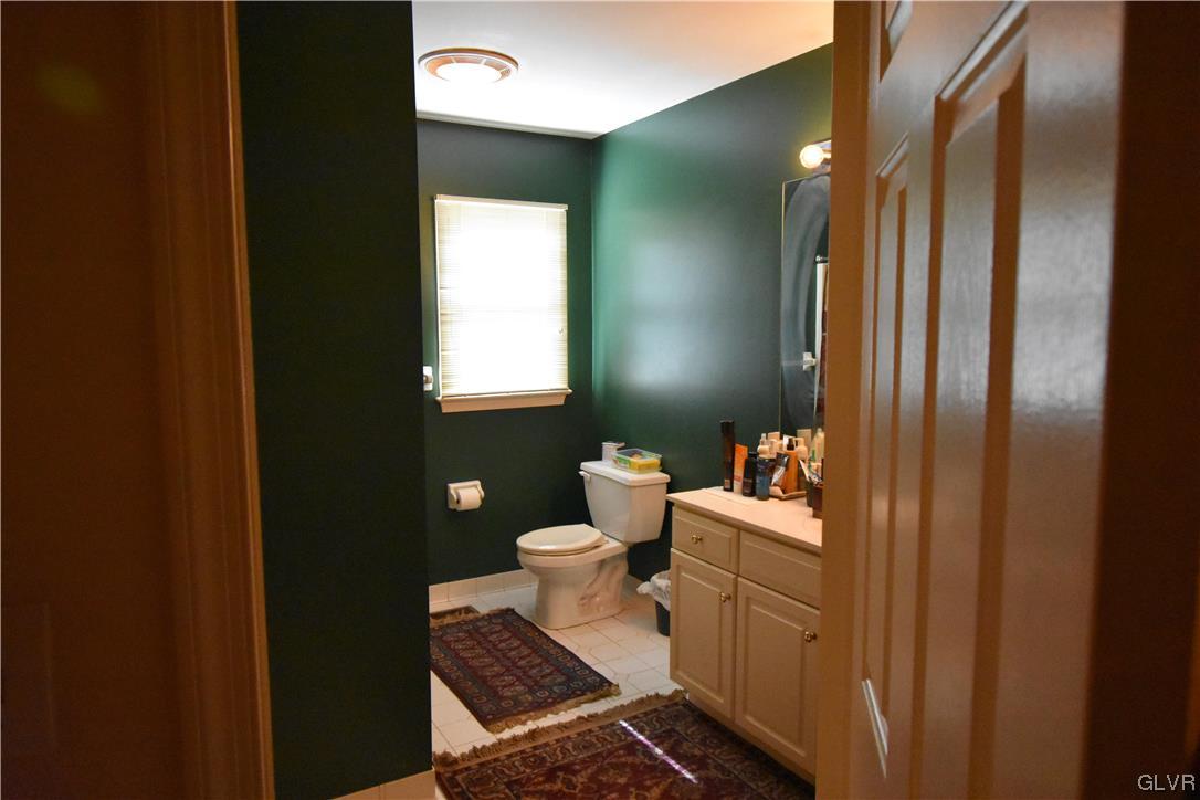 1039 Stone Stack Drive Bethlehem, PA 18015 - Photo 28 of 35 a bathroom with a sink toilet and mirror