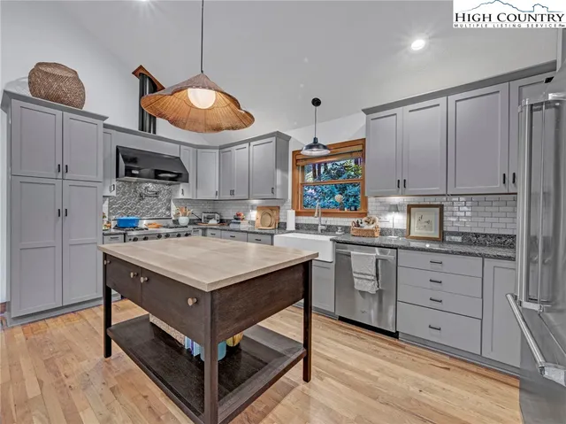 a bedroom with a bed and dresser