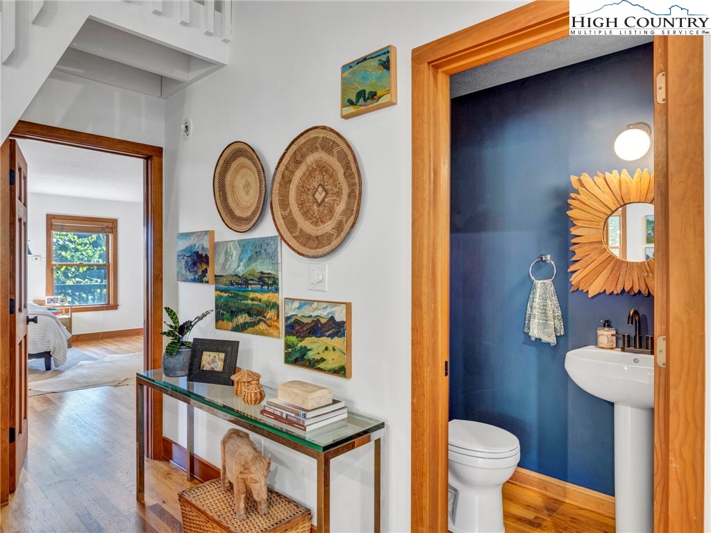 165-201 All Hallows Road Boone, NC 28607 - Photo 19 of 46 a living room with furniture and a mirror