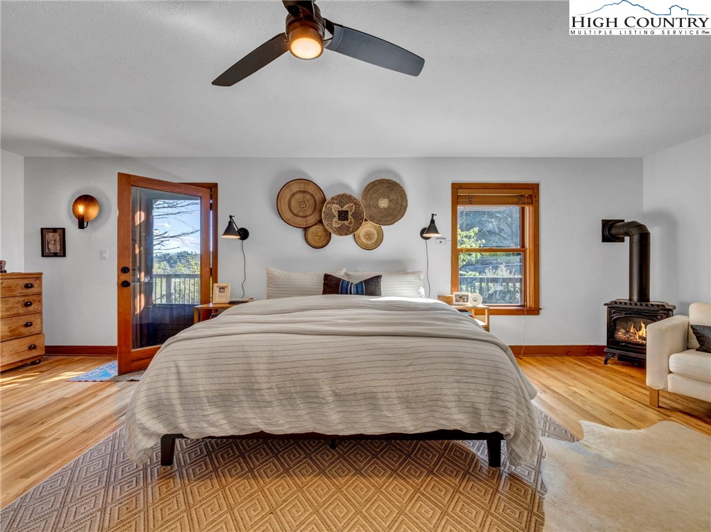 165-201 All Hallows Road Boone, NC 28607 - Photo 21 of 46 a bedroom with a bed and dresser