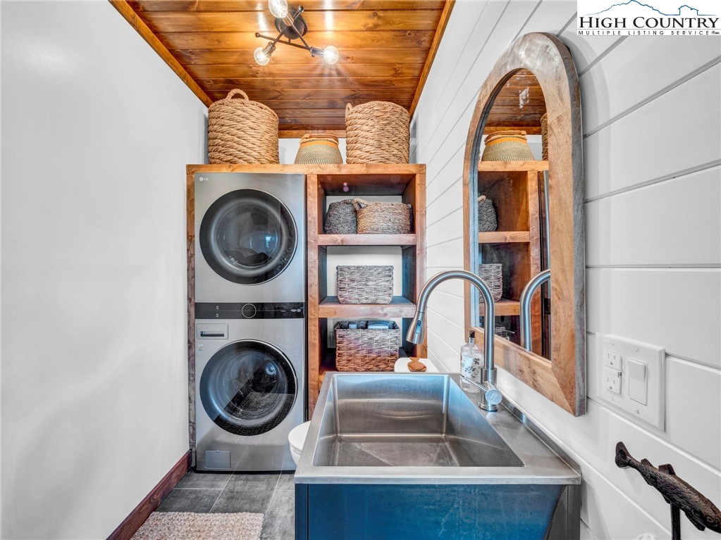 165-201 All Hallows Road Boone, NC 28607 - Photo 37 of 46 a view of living room with washer and dryer