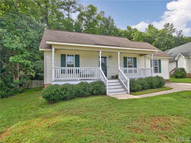 4309 Pillory Place Raleigh, NC 27616 - Photo 2 of 23 a front view of a house with a garden
