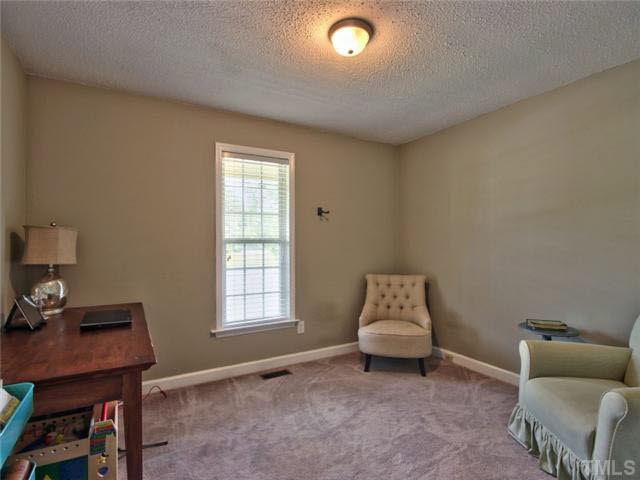 4309 Pillory Place Raleigh, NC 27616 - Photo 14 of 23 a room with furniture and window