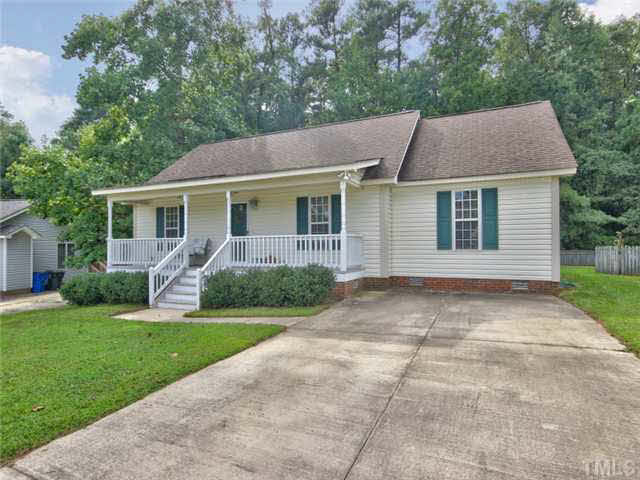 4309 Pillory Place Raleigh, NC 27616 - Photo 23 of 23 a view of a house with a yard and potted plants