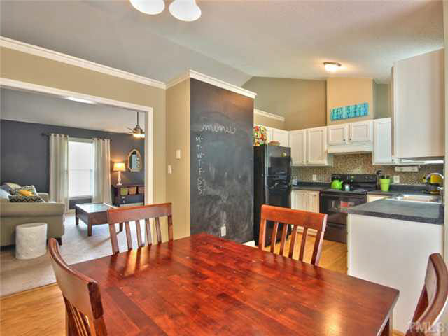 4309 Pillory Place Raleigh, NC 27616 - Photo 8 of 23 a view of a dining room with furniture