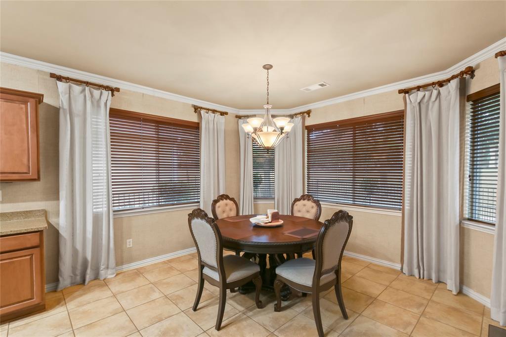 9116 Perimeter Street Denton, TX 76207 - Photo 12 of 26 a view of a dining room with furniture window and outside view