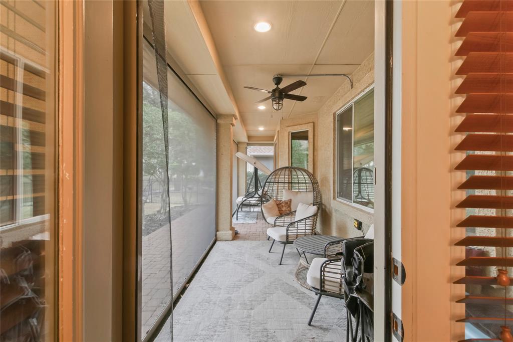 9116 Perimeter Street Denton, TX 76207 - Photo 23 of 26 a very nice looking room with a large window and glass door